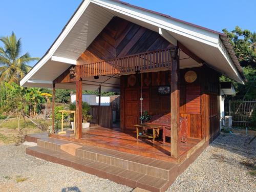 ม่วนใจ๋ปันสุข โฮมสเตย์แอนคาเฟ่ Muanjai punsuk homestay and cafe Room Type - One-Bedroom House