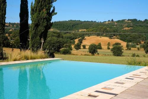 La Stellata Casale toscano con piscina Tuscan farmhouse with swimming pool