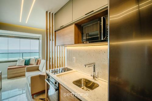 Cocina, SOA - Condominio a 300m de la Playa dos Artistas en Salvador (SOA - Condominio a 300m da Praia dos Artistas em Salvador) in Itaigara