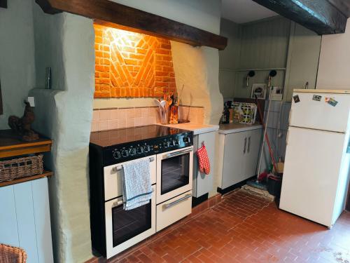 virtuve, Chez Johns in Saint-Pierre-des-Jonquieres