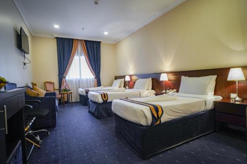 Chambre triple, 3 lits