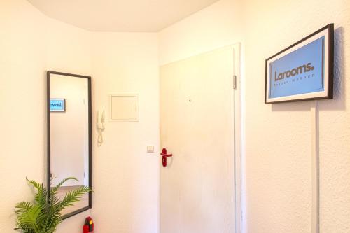 ทางเข้า, Larooms - WhiteRock 1, zentrale Lage, tolle Anbindung in เมอร์เซอบวร์ก