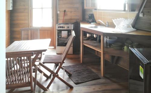 Cocina, Bungalow charmant avec piscine partagée à Le Robert (Bungalow charmant avec piscine partagee a Le Robert) in Le Robert