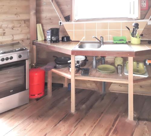 Bungalow charmant avec piscine partagée à Le Robert (Bungalow charmant avec piscine partagee a Le Robert) in Le Robert