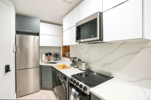 48-3RW Brand New 1BR Prime Hells Kitchen - W&D - main image