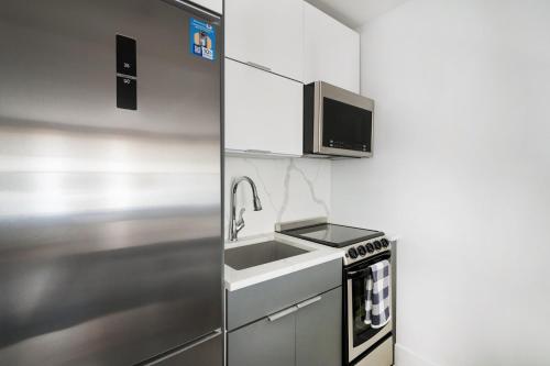 1597-7 Luxury Upper East Studio W&D in unit, New York (fotografie 5)