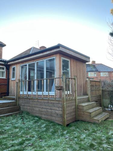 Tiny house with pull down bed in Cottingham