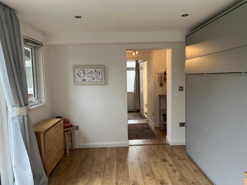 Tiny house with pull down bed in Cottingham