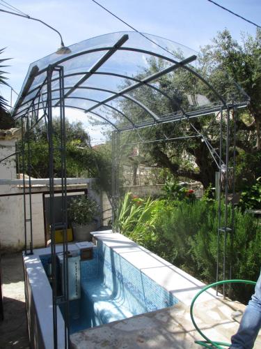 Swimming pool, Goatshed in Asini