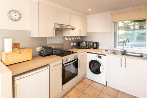 ห้องครัว, Woolacombe Beach Retreat Apartments in วูลาคอมบ์