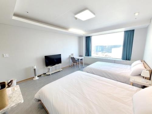 仁川 Incheon Airport Line Guesthouse 酒店 套房