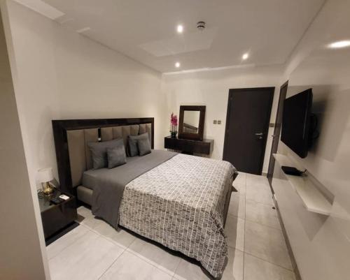 Cozy & Luxurious East Legon Apt with gym, pool & rooftop, Akra (zdjęcie 8)