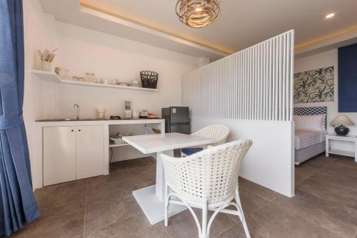 Kitchen, White&Blue Pool Villas in Tanote Bay