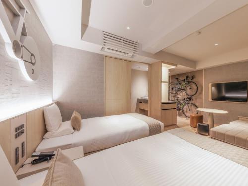 Superior Twin Bike Friendly Room With shower booth