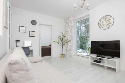 Зручності, Jasny Apartament z Tarasem i Parkingiem by Noclegi Renters in Пясечно