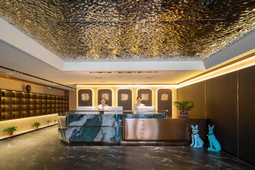 Előcsarnok, 西安驿周游青旅 in Qujiang Hatalmas Vadlúd  Pagoda