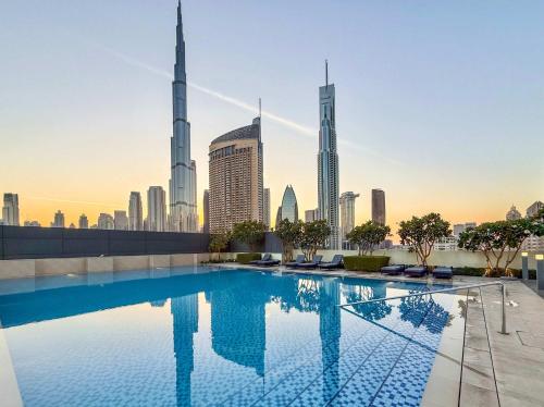 Elegant 4BR with Burj Khalifa and Fountain Views - image 12