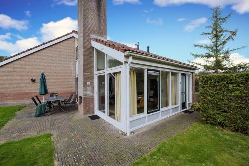 Blauwreiger I Geniet in dit Moderne Huisje in 茲維赫爾特