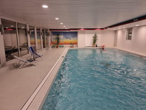 Peldbaseins, Ski fahren-Schneeschuhwandern-Langlauf inkl Hallenbad in Luzein