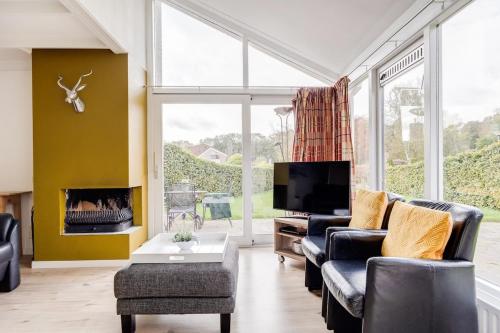 Houtsnip I Vakantiehuis met Tuin en Openhaard in 茲維赫爾特