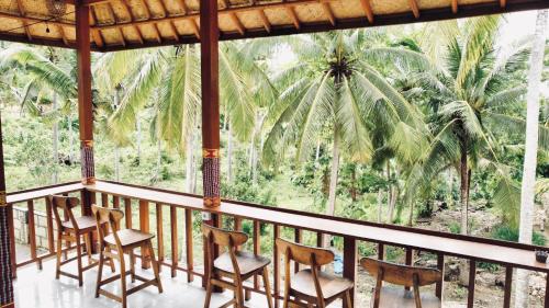 Étterem, 35 négyzetméteres, 1 hálószobás Villa 1 fürdőszobával Nusa Ceningan területén (The Lebah Kelingking Villa) in Nusa Penida