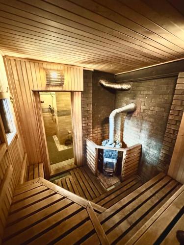 Sauna, Guest House Jugland with Private Sauna Hot Tub and River Access Near Riga in Tīnūži
