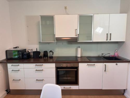 Konyha, FC-Apartmenthaus Falkensee mit großem Garten und PKW Stellflächen (FC-Apartmenthaus Falkensee mit großem Garten und PKW Stellflachen) in Falkensee