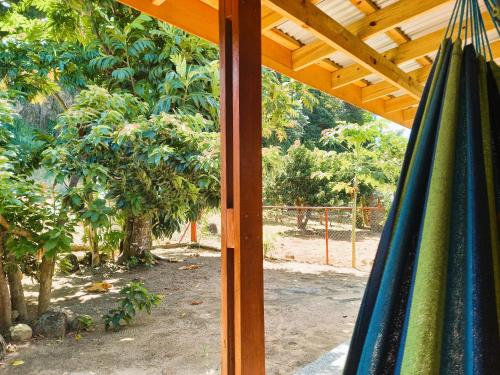Dado's Place - 2 bedroom house with AC and verandah in Calibishie