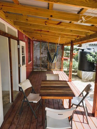 Dado's Place - 2 bedroom house with AC and verandah in Calibishie