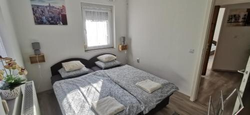Rigófészek Apartmanház