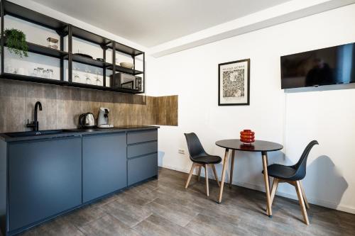 Kjøkken, Boardinghaus Grünefeld W1 - Schöne Serviced Apartments - Küche - Smart TV - P - Rainshower (Boardinghaus Grunefeld W1 - Schone Serviced Apartments - Kuche - Smart TV - P - Rainshower) in Mettingen