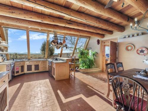 Earthship in Taos - A Sustainable Desert Sanctuary in Arroyo Seco
