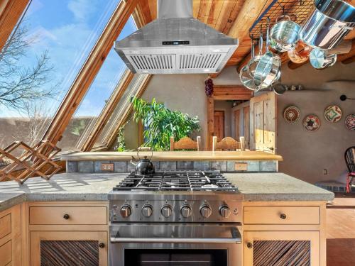 Earthship in Taos - A Sustainable Desert Sanctuary in Arroyo Seco