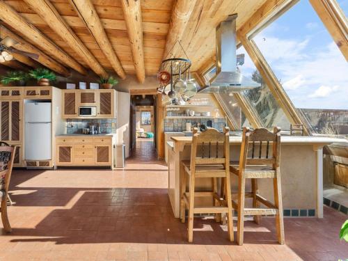 Earthship in Taos - A Sustainable Desert Sanctuary in Arroyo Seco