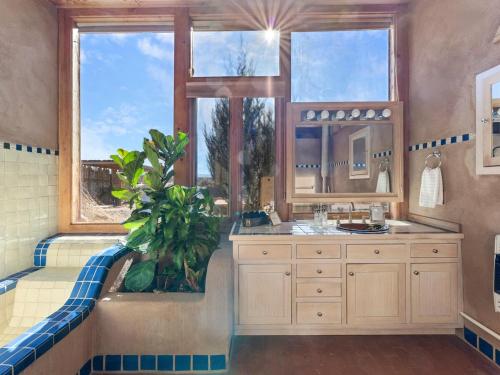 Earthship in Taos - A Sustainable Desert Sanctuary in Arroyo Seco