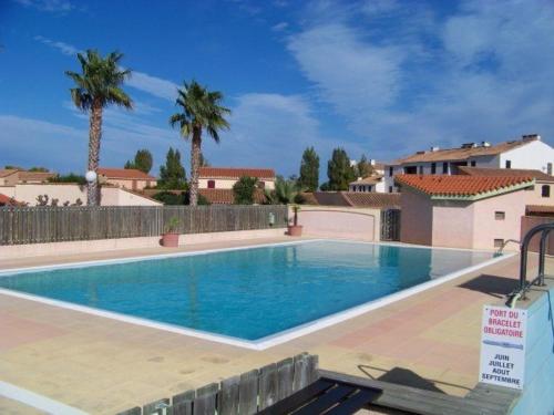 Two-Bedroom House room in Jolie maison avec piscine collectif ST CYPRIEN PLAGE SC380-103