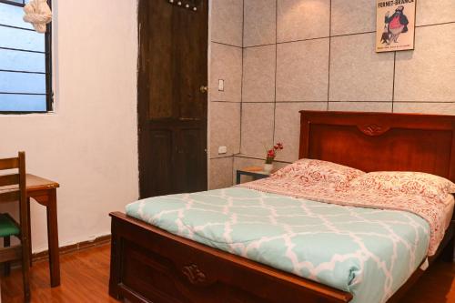 Economy Quadruple Room with Shared Bathroom image 2