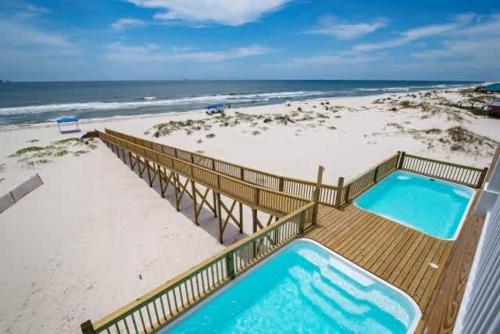 BeachFront 5Bed EasyBreezy West in ฟอร์ต มอร์แกน