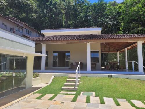 Casa com lazer 5 quartos em Condominio 200 metros da Praia in Praia Do Guaeca