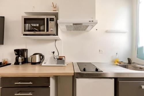 keittiö, Kinkala, charmant 2 pièces à 20 minutes de Paris (Kinkala, charmant 2 pieces a 20 minutes de Paris) in Le Blanc-Mesnil