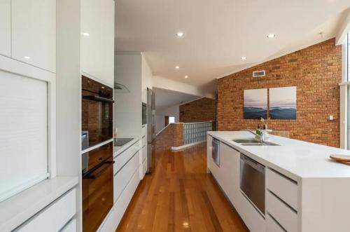 House on the Hillside with City Views Sleeps 12