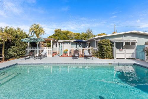 Shells Family Beach House Coastal Retreat with Private Pool Golf Cart & Steps to the Beach