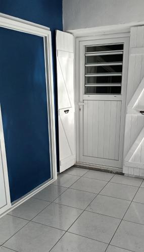 Entrance, Chambre climatisee in Bouillante