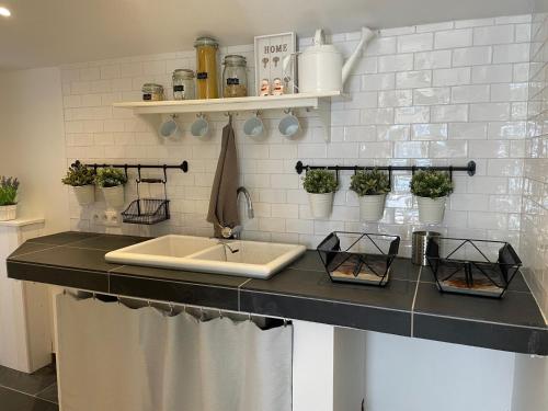 Konyha, Huize Emma in Lamswaarde