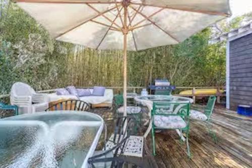 Chill Fire Island Beachfront Cottage with Amazing Bay and Sunset Views, Perfect Location in Fair Har in Kismet