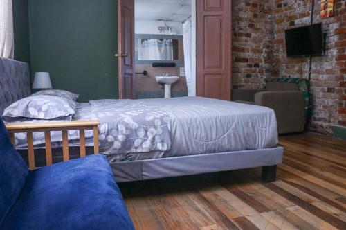 Quadruple Room with Bathroom room in Blue House Youth Hostel