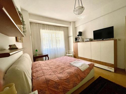 Grande stanza con letto matrimoniale bagno privato zona San Paolo-Trastevere-ROMA TRE chez l'habitant, Rome (photo 9)
