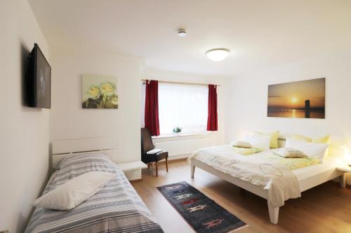 Haus am Kurpark Wohnung 18 in בוסום