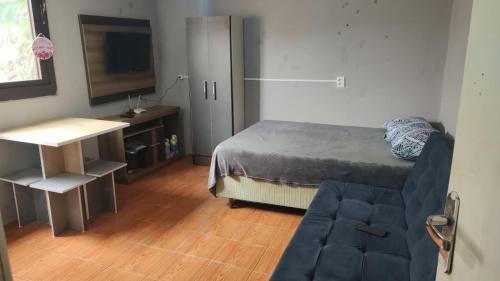 Kitnet geminada próximo da praia, Torres