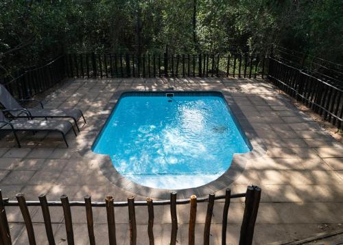 Piscină, Mazuri Bush Cottages in Hluhluwe